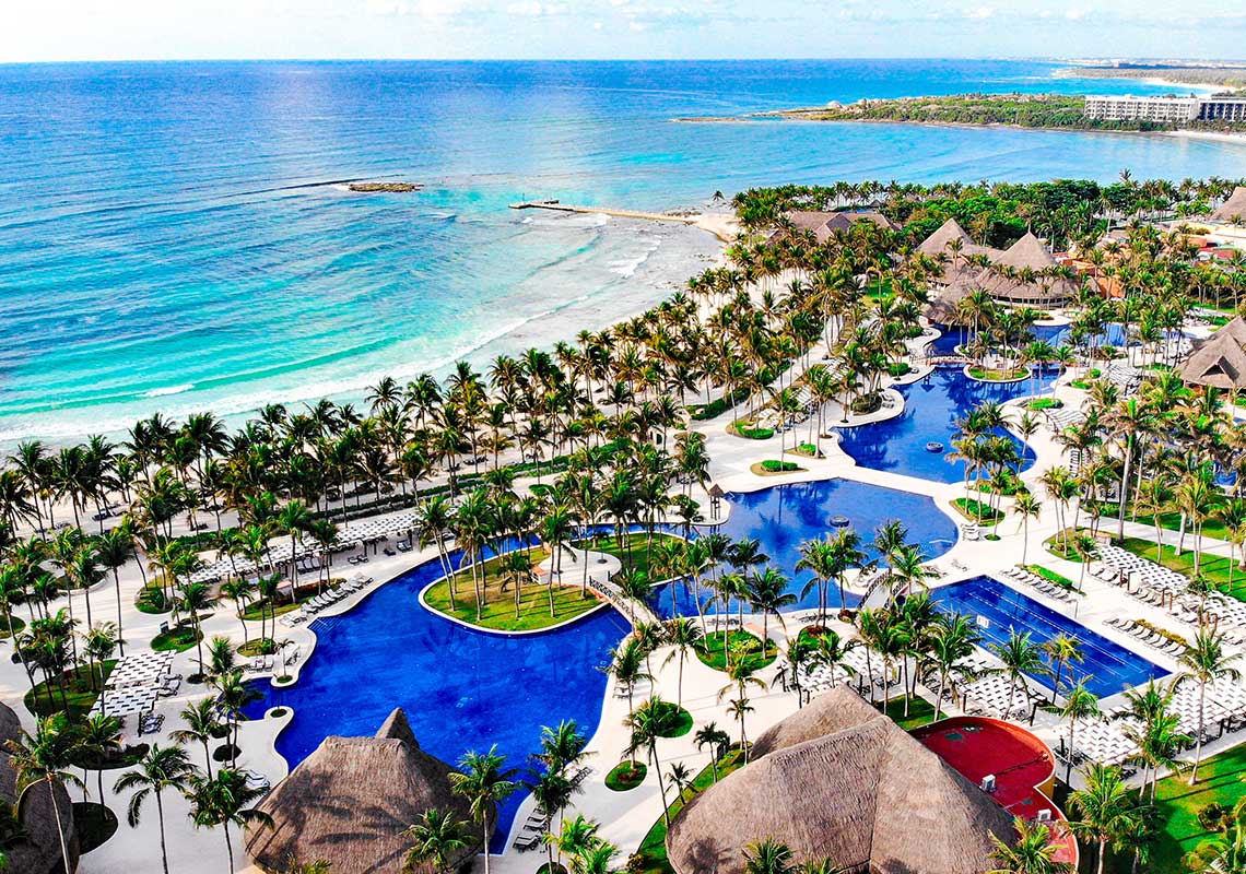 Barcelo Maya Colonial all-inclusive resort with expansive pools, beachfront location, and access to the massive Barcelo Maya Grand Resort complex.