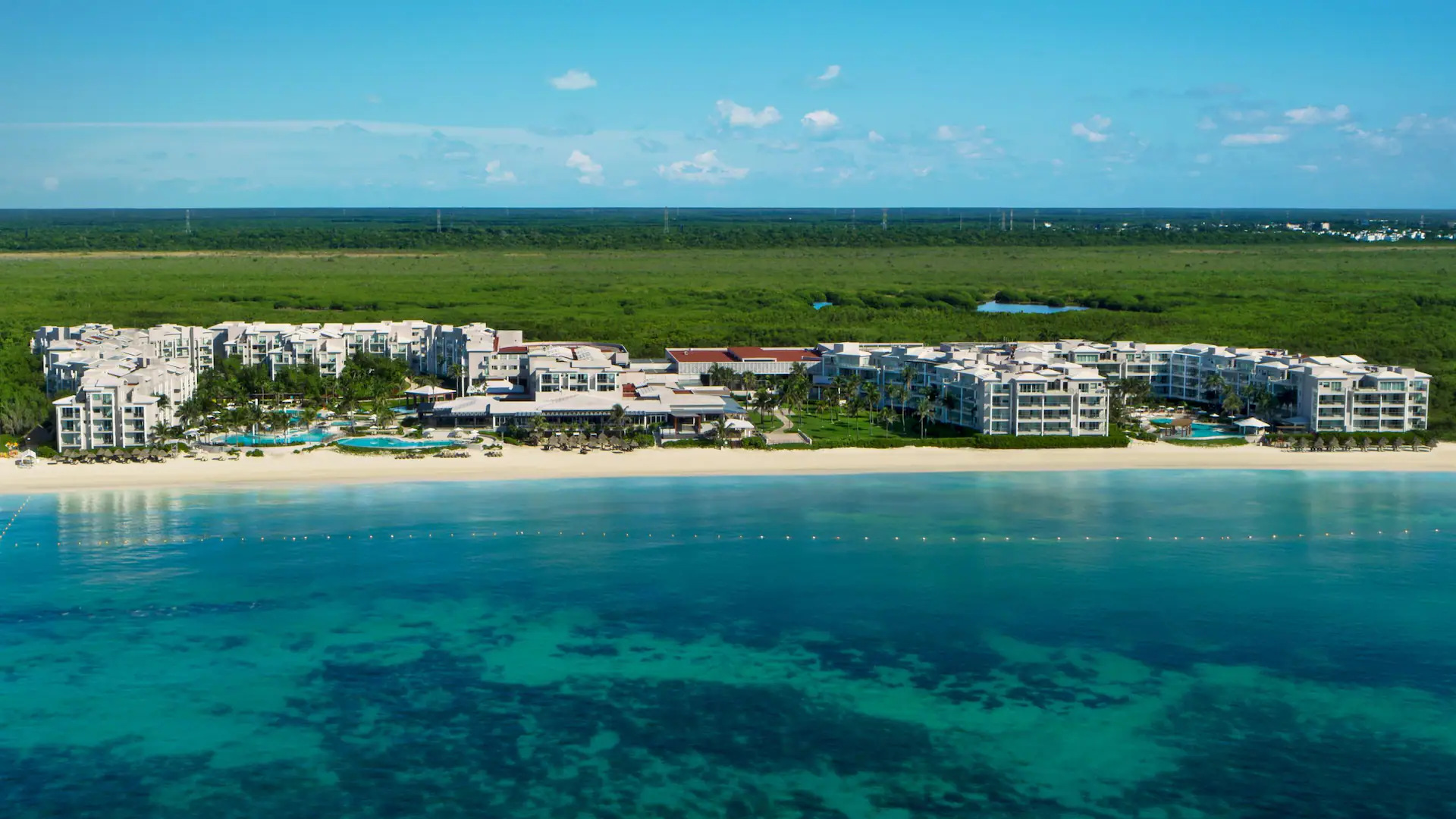 Dreams Jade Riviera Maya all-inclusive beachfront resort with modern design and oceanfront pools.