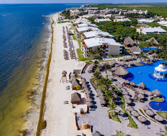 Dreams Sapphire Riviera Maya all-inclusive resort with beachfront pools, white sand beach, and tropical Caribbean setting.