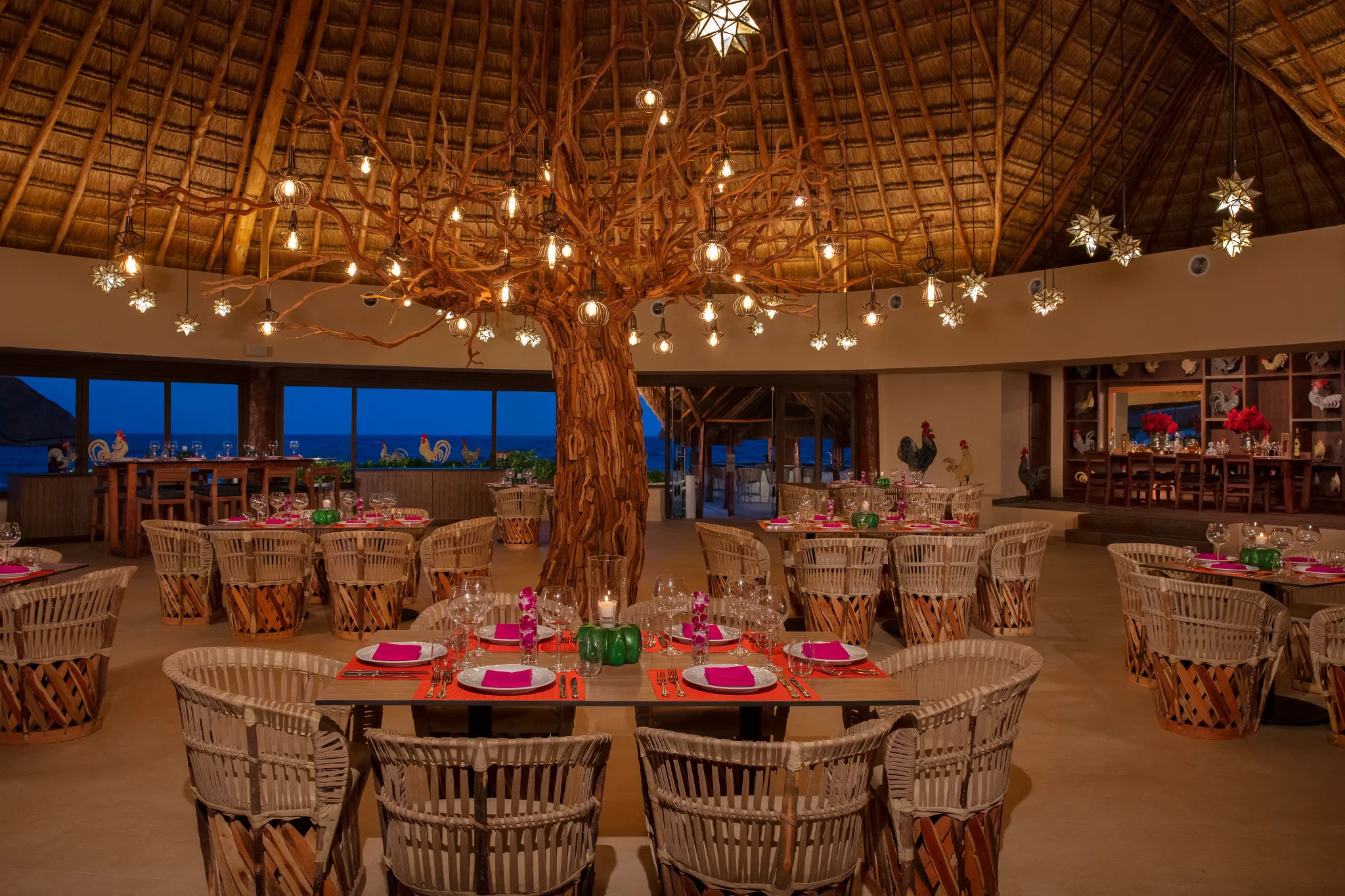El Patio restaurant at Dreams Aventuras Riviera Maya featuring authentic Mexican décor, colorful accents, and an inviting indoor dining atmosphere.