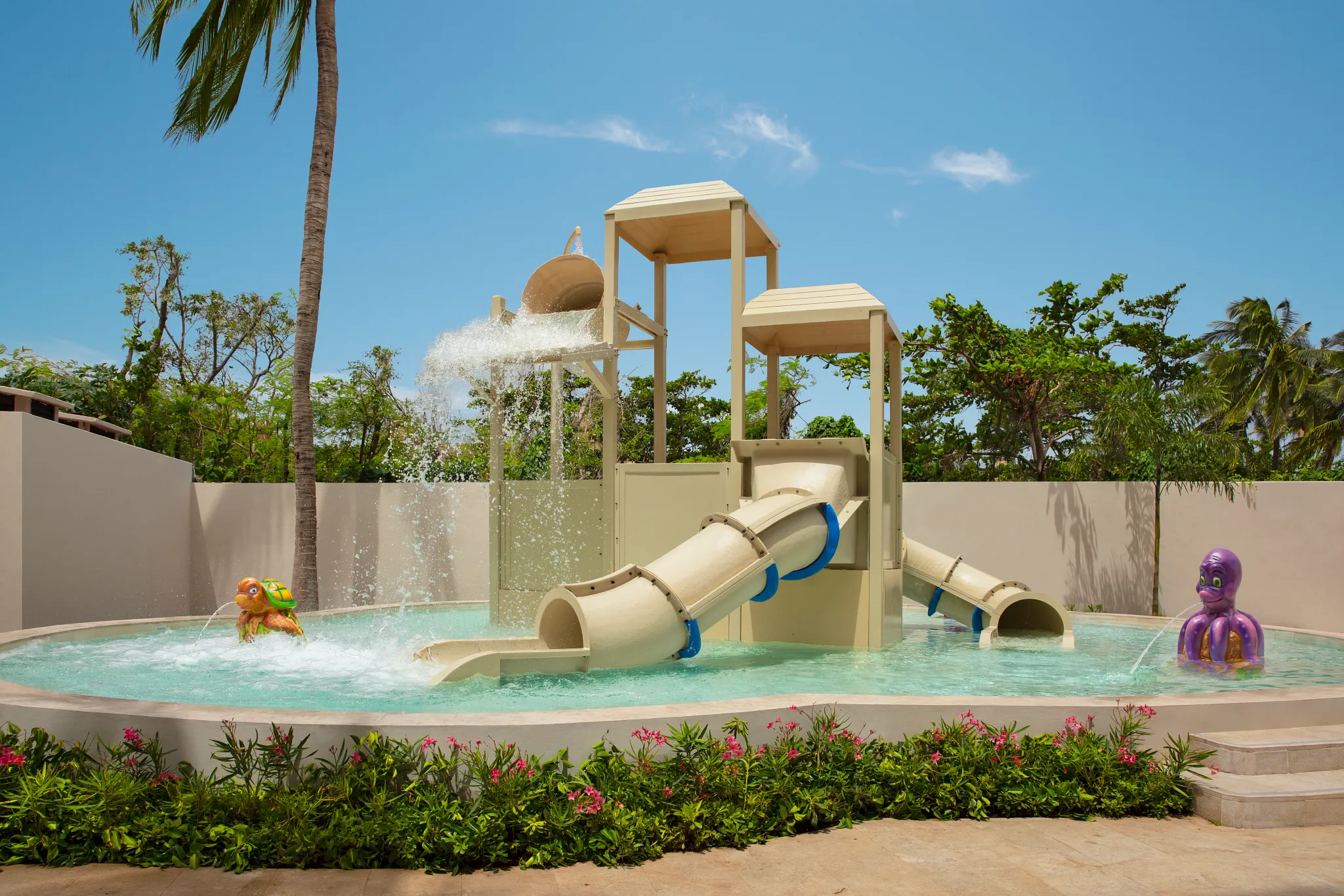 Kids water playground with slides and splash features at Dreams Aventuras Riviera Maya.