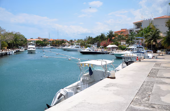 Puerto Aventuras Marina near Dreams Aventuras Riviera Maya with scenic yachts, waterfront dining, and marina views