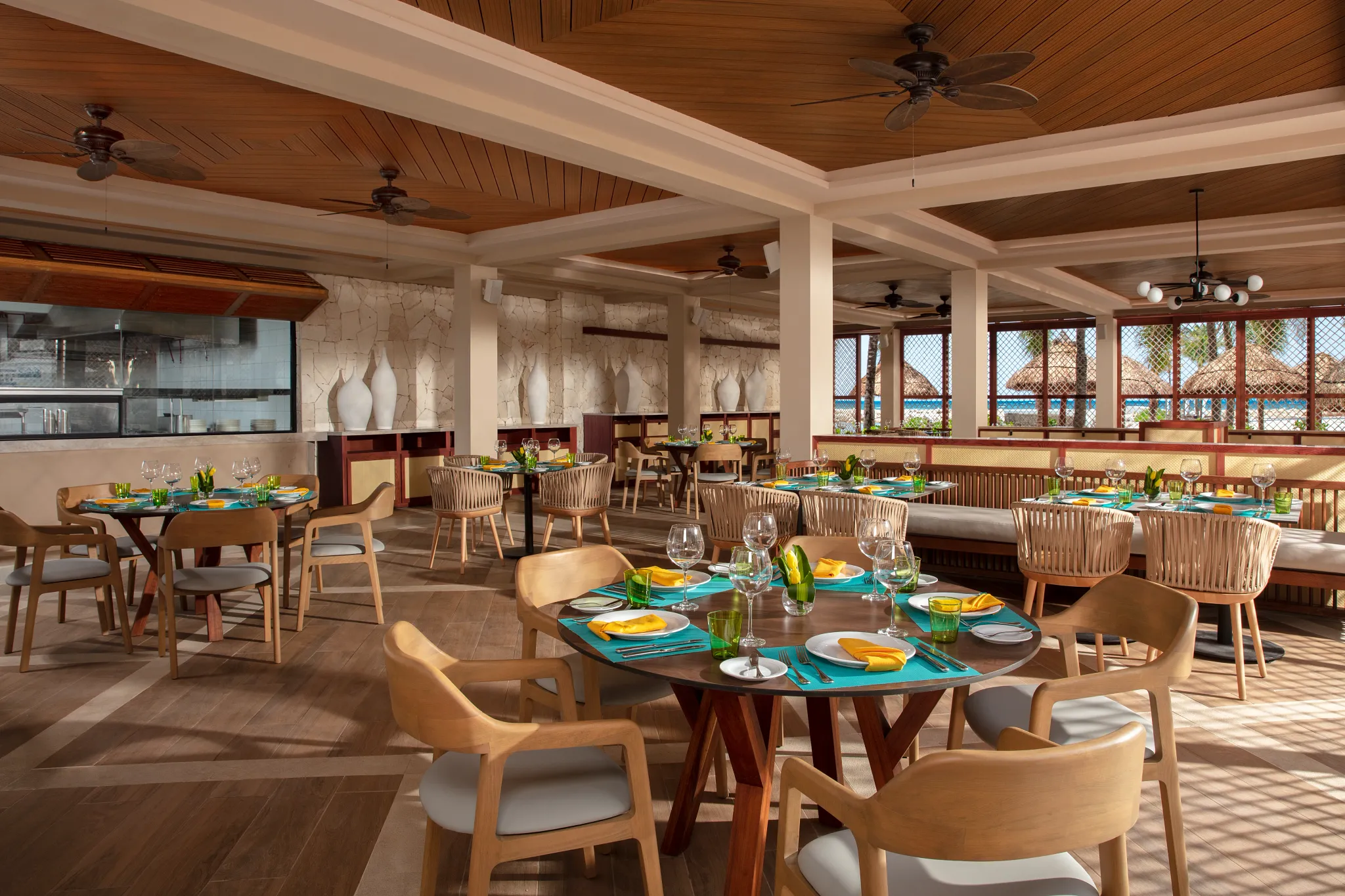 Seaside Grill at Dreams Aventuras Riviera Maya featuring open-air beachfront dining, grilled specialties, and relaxed oceanview ambiance.