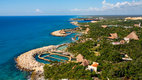 Xcaret Eco Theme Park near Dreams Aventuras Riviera Maya with natural attractions, cultural shows, and eco-adventures